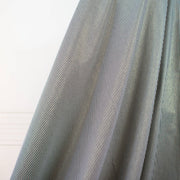 gorgeous silk ottoman suiting fabric by the yard. Featuring classic black and white horizontal stripe, enhanced by the subtle shimmer of gold metallic threads. Perfect for creating a formal gown, suiting, or a lovely lightweight coat to pair with that little black dress! Image of fabric drape.