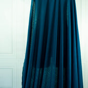 Italian Viscose Tissue Jersey designer deadstock fabric by the yard. Enjoy a bit of high-end designer British luxury! Casual, elegant, and soft, this tissue jersey has a lovely drape, thin hand, and is light and translucent. Perfect for a dress, loungewear, or T-Shirt or layering piece. Image of fabric drape.