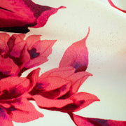 Italian Floral Silk satin designer deadstock fabric by the yard. Ready to create something gorgeous with our silk satin fabric of red and pink blooms highlighted by a bit of black for drama set against a white background. This thin woven silk from the Italian mills has a smooth satiny hand and just the right amount of flow! Image of fabric printing defect.