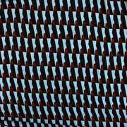 Italian Geometric Poly Satin designer deadstock fabric by the yard. From the Italian mills, a gorgeous satin with a modern palette of light blue, earthy brown and black that will elevate your next sewing project! Image of fabric design.