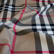 Couture British Designer Plaid Scuba Knit designer deadstock fabric by the yard. Bring on that London Style, in a classic plaid with a bit of a twist...it's scuba! Close up image.