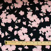 Couture Italian Viscose Floral Jacquard - 'All My Heart'! This stunning designer deadstock fabric by the yard features a gorgeous black base with delicate pink florals and ivory accents. Plus, playful and trending jacquard hearts add a touch of whimsy. 
Featuring a nice drape that falls away from the body and slightly textured hand, you'll find this fabric is perfect for formal attire or a little something special.  Image of pattern design scale with ruler.