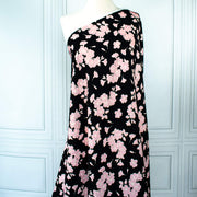 Couture Italian Viscose Floral Jacquard - 'All My Heart'! This stunning designer deadstock fabric by the yard features a gorgeous black base with delicate pink florals and ivory accents. Plus, playful and trending jacquard hearts add a touch of whimsy. 
Featuring a nice drape that falls away from the body and slightly textured hand, you'll find this fabric is perfect for formal attire or a little something special.  Full image of fabric drape on dressform.
