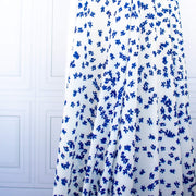 Image of fabric drape. Couture, Italian, blue and white floral crepe deadstock fabric by the yard. Sourced from a Los Angeles designer of ready-to-wear and bridal pieces and a favorite among some of Hollywoods A-List stars!