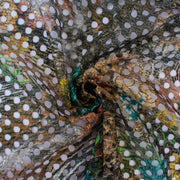 Couture designer deadstock Darquer lace by the yard boasts a playful mix of florals and animal print accentuated by metallic threads in warm gold and copper tones. The unexpected combination of turquoise florals, green leaves, and black-and-white animal print will surely catch some attention. Image of fabric fullness.