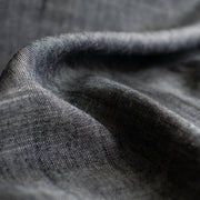 Stay cool and look amazing while you enjoy the breathability and sustainability of Tencel and all you love about linen in one gorgeous dark indigo fabric.   On the lighter side of a mid-weight with a beautiful sheen, nice drape, and softly textured hand you'll look 'Tres Chic'!  Close up image of fabric weave.