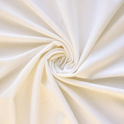 High-End Designer Pearl White Ponte Knit fabric by the yard. This Los Angeles designer has a knack for finding quality fabrics. This designer deadstock Ponte is soft with a nice drape that falls moderately close to the body. You'll fall in love with the comfort! Image of fabric fullness.