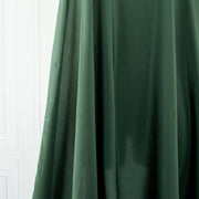 100% Silk Crepe de Chine fabric by the yard in Fern Green. Soft and fluid, this semi-textured fabric offers a beautiful drape and the luxury of silk. Image of fabric drape.