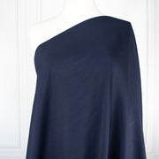 Fine Egyptian Pima Cotton Pique Shirting fabric by the yard. Imported from Switzerland, our fabric boasts a luxurious cotton that is semi-sheer and has a soft, semi-crisp hand. Perfect for a high-end and comfortable shirt, dress, skirt or top!  Image of fabric on dressform.