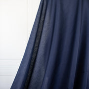 Fine Egyptian Pima Cotton Pique Shirting fabric by the yard. Imported from Switzerland, our fabric boasts a luxurious cotton that is semi-sheer and has a soft, semi-crisp hand. Perfect for a high-end and comfortable shirt, dress, skirt or top!  Image of fabric drape.