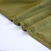 NYC Designer deadstock fabric by the yard. This linen and cotton blend shirting has such a lovely soft hand you'll absolutely love it. The fabric has a  supple drape, and leans towards a mid-weight. Image of selvedge.