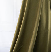 NYC Designer deadstock fabric by the yard. This linen and cotton blend shirting has such a lovely soft hand you'll absolutely love it. The fabric has a  supple drape, and leans towards a mid-weight. Image of fabric drape.