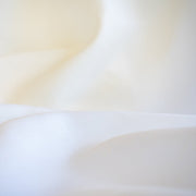 NYC Designer Linen blend designer deadstock fabric by the yard is the perfect fabric if you just love linen.  A plain weave off-white fabric with a soft, slightly crisp hand.  Close up glamour image.