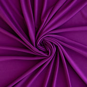 Designer ITY Solid Jersey Knit designer deadstock fabric by the yard. Perfect for travelwear, this ITY is universally flattering in a gorgeous light Orchid purple color. Image of fabric fullness.