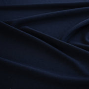 Designer ITY Solid Jersey Knit designer deadstock fabric by the yard. Perfect for travelwear, this ITY is sophisticated and elegant. The perfect choice for your next sewing project. Close up image.