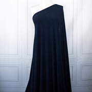 Designer ITY Solid Jersey Knit designer deadstock fabric by the yard. Perfect for travelwear, this ITY is sophisticated and elegant. The perfect choice for your next sewing project. Image of fabric drape on dressform.