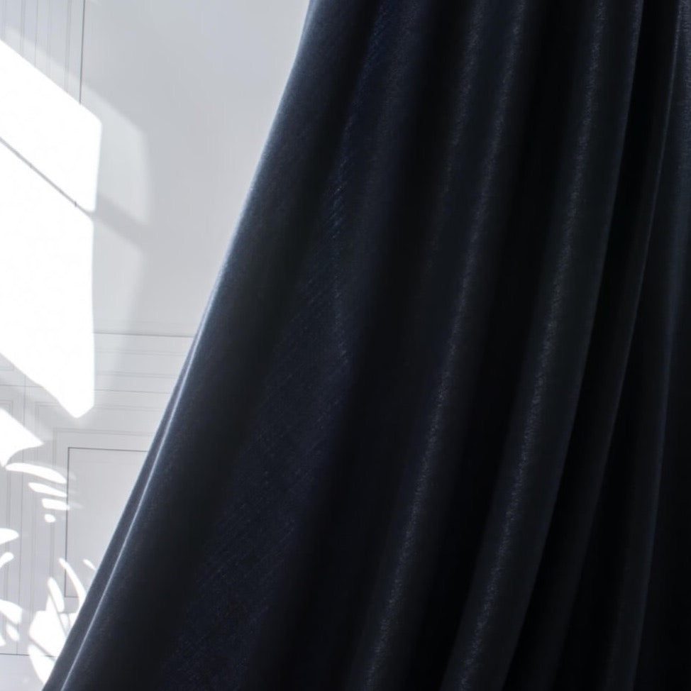 Image of fabric drape. A gorgeous wool blend suiting from a Beverly Hills couture house is sure to add glamour to your outfit!  A soft textured hand with a herringbone stripe pattern that shimmers with silvery metallic threads. A perfect choice for a jacket, skirt, wide leg pant, or perhaps a coat dress.