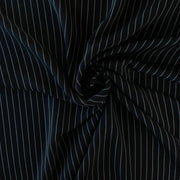 Gorgeous Couture Designer 4-Ply Silk Black with a white vertical double pinstripe, this premium medium weight silk has a soft sheen and gentle drape. A fine smooth hand feels buttery on the skin, perfect for a wide leg pant, vest, jacket or dress! Image of fabric body.
