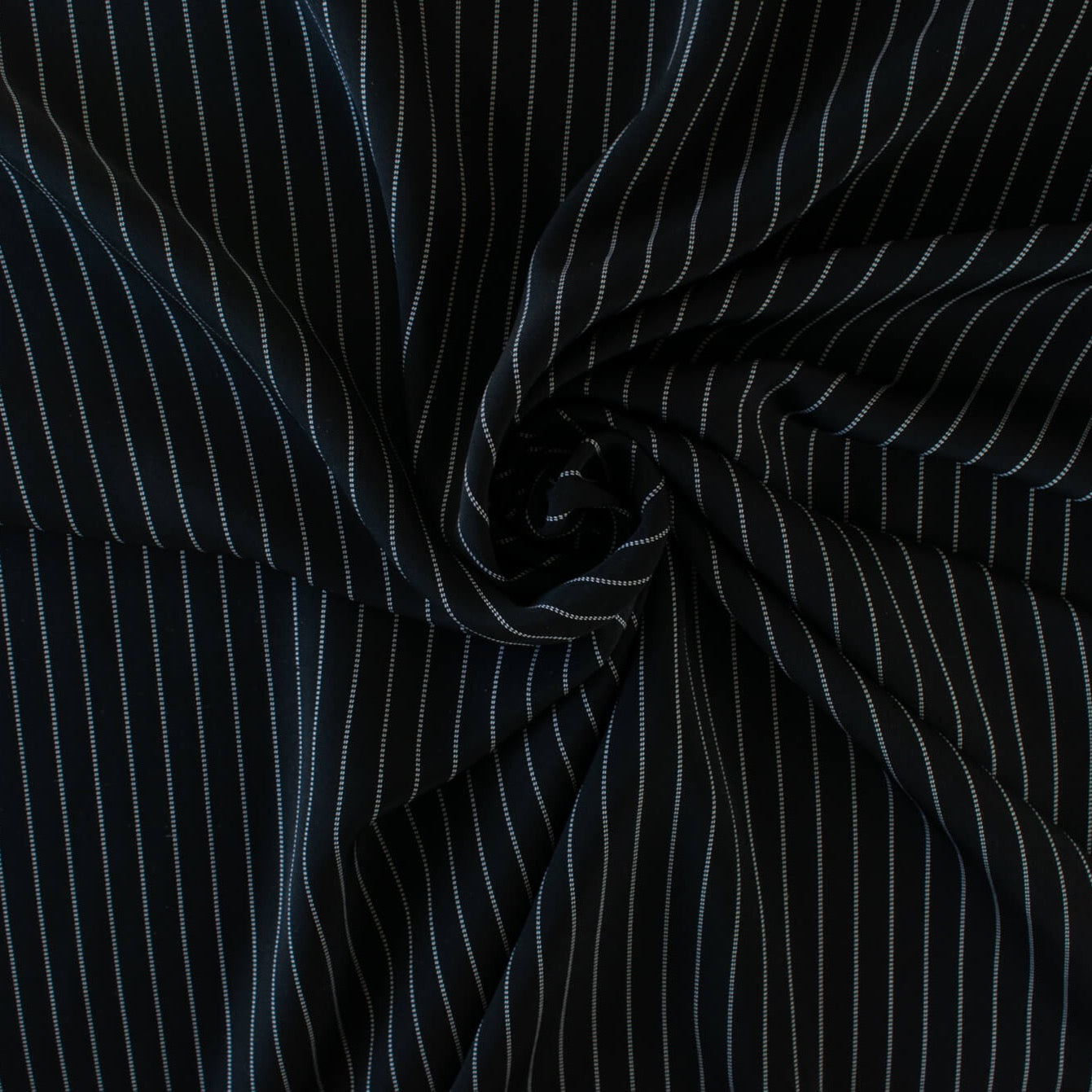 Gorgeous Couture Designer 4-Ply Silk Black with a white vertical double pinstripe, this premium medium weight silk has a soft sheen and gentle drape. A fine smooth hand feels buttery on the skin, perfect for a wide leg pant, vest, jacket or dress! Image of fabric body.