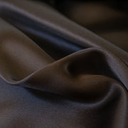 Indulge yourself in the luster of 100% Silk Charmeuse from a NYC Designer. A popular fabric for creating fluid bias cut garments and luxurious lining to your special pieces like the French Jacket. Close up photo.