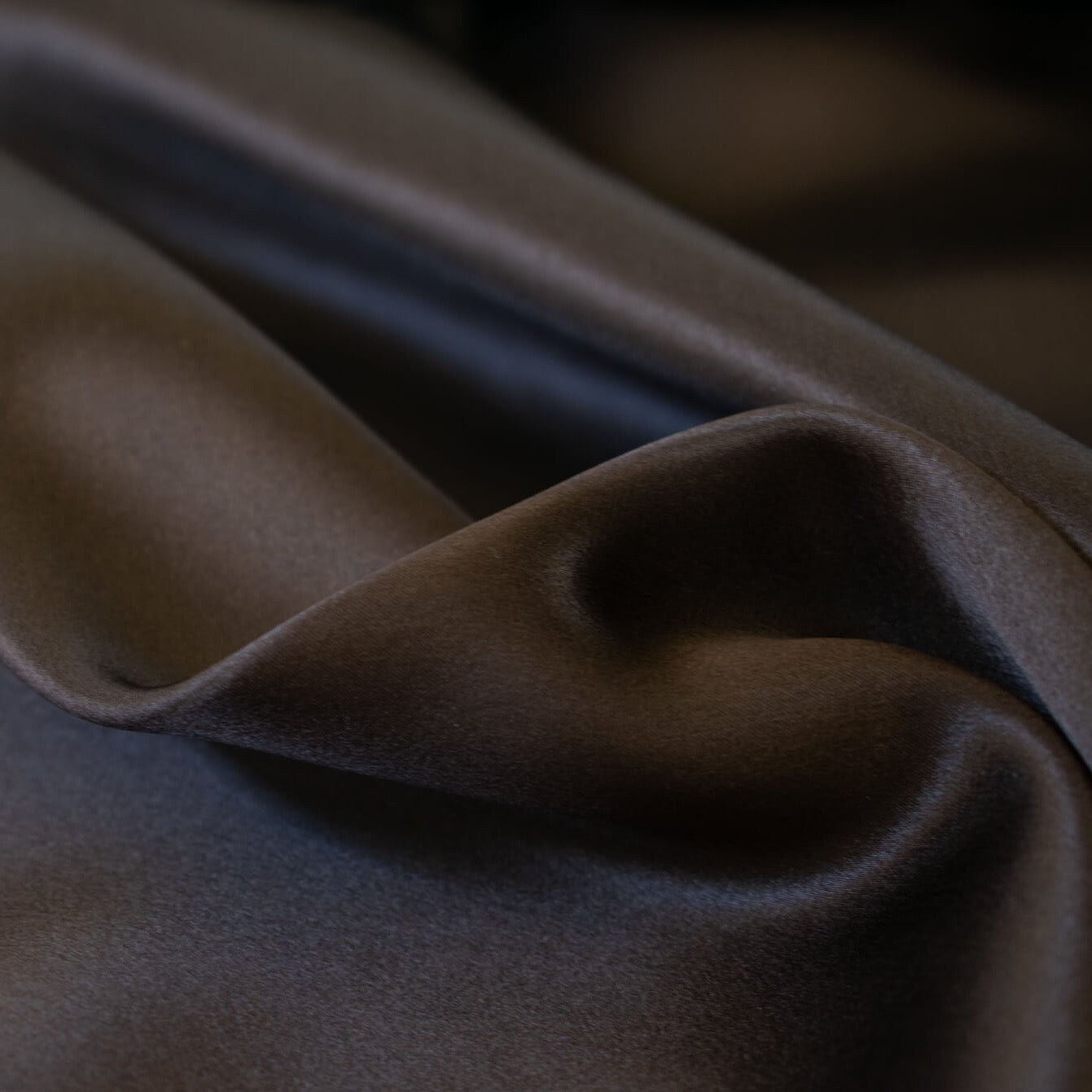 Indulge yourself in the luster of 100% Silk Charmeuse from a NYC Designer. A popular fabric for creating fluid bias cut garments and luxurious lining to your special pieces like the French Jacket. Close up photo.