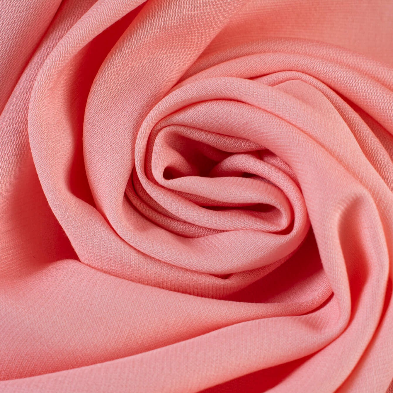 Perfect pink for grownups!  This famous designer suiting is perfect for spring and it's such a flattering shade of pink.  Pair it with navy, creams, of taupe for a sophisticated look.  Soft with a textured hand.