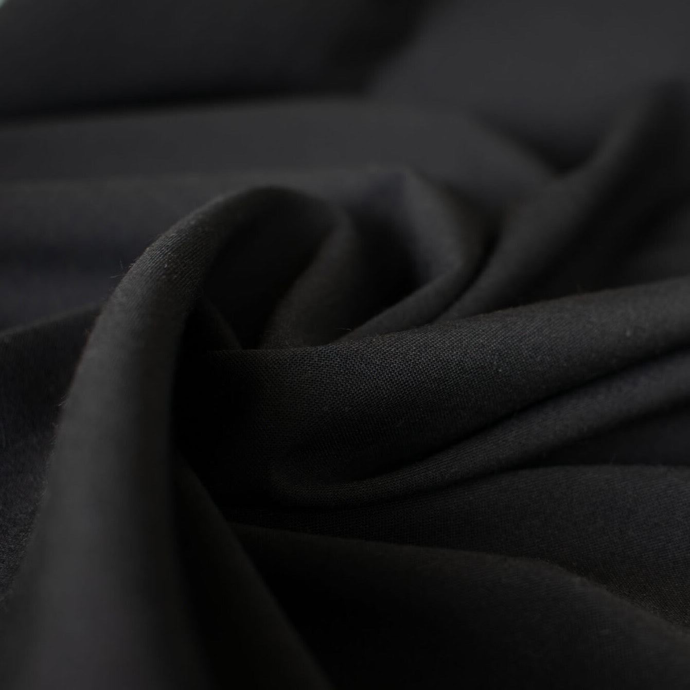 talian lightweight worsted wool suiting is just stunning.  This fabric is gorgeous and will be a true wardrobe builder.  It has the wear and strength of a woolen and a bit of stretch for comfort. Sew up a classic fitted sheath dress or maybe even a jacket. You can't go wrong with a fabric that is multi-seasonal.