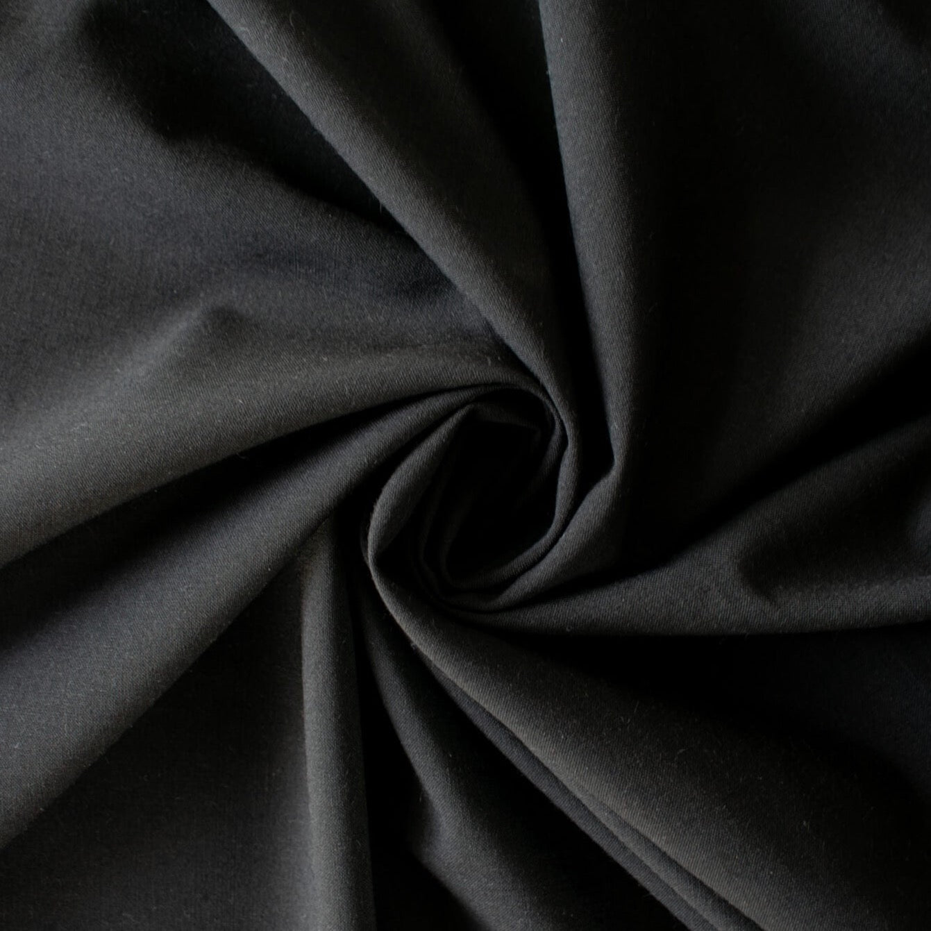 talian lightweight worsted wool suiting is just stunning.  This fabric is gorgeous and will be a true wardrobe builder.  It has the wear and strength of a woolen and a bit of stretch for comfort. Sew up a classic fitted sheath dress or maybe even a jacket. You can't go wrong with a fabric that is multi-seasonal.