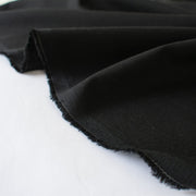 talian lightweight worsted wool suiting is just stunning.  This fabric is gorgeous and will be a true wardrobe builder.  It has the wear and strength of a woolen and a bit of stretch for comfort. Sew up a classic fitted sheath dress or maybe even a jacket. You can't go wrong with a fabric that is multi-seasonal.