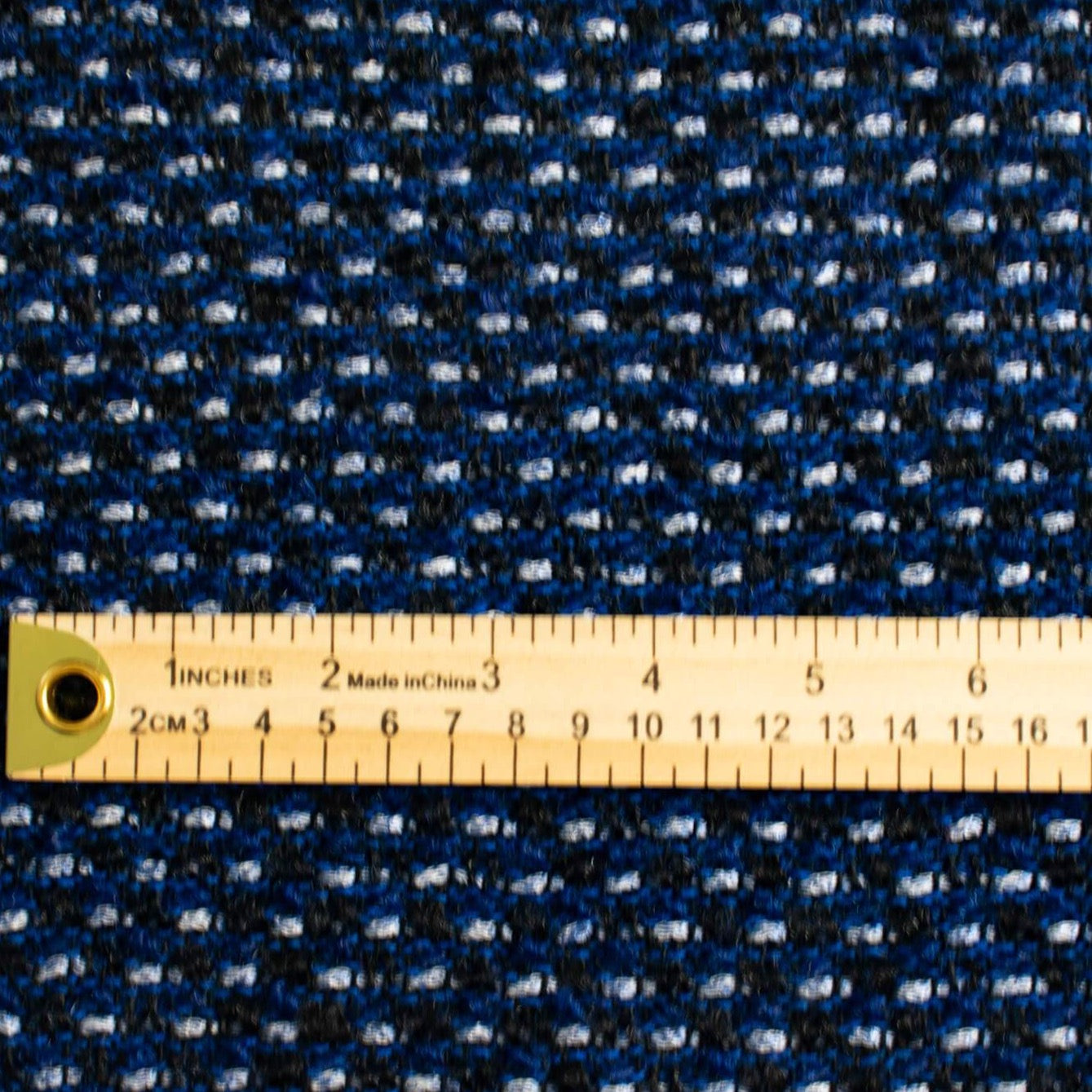 This is a lovely wool boucle imported from Italy. Dress it up or down you will love the softness. Ideal for you French Jacket with a fantastic selvedge! Photo with ruler for scale.