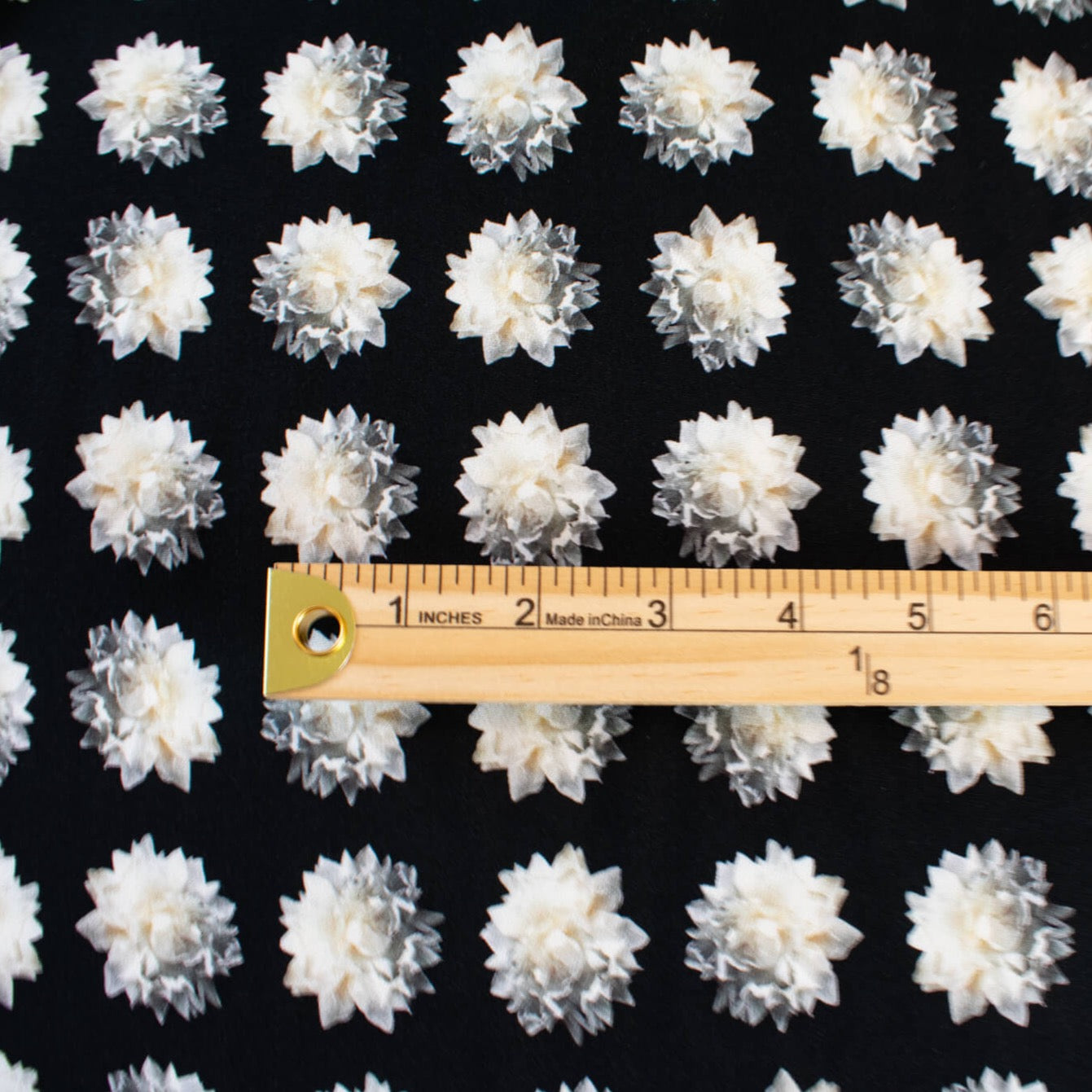 Black/White Floral Italian Viscose/Lycra 4-Ply Crepe  -'Fiore Bianco' image of print scale with ruler