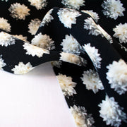 Black/White Floral Italian Viscose/Lycra 4-Ply Crepe  -'Fiore Bianco' image of selvedge edge