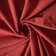 NY Designer cotton/lycra jersey in a warm scarlett red is super soft and super wide!  It is on the lighter side of a mid-weight and has excellent stretch and recovery. A cotton knit with lycra is perfect for sewing up a gorgeous top for warmer weather!