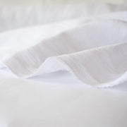 This special European washed linen from Italy is airy, light, and simply gorgeous. A linen that is so soft...perfect for warmer weather. Stay on trend and sew up a lovely relaxed tunic or maxi! Image of fabric selvedge