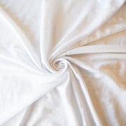 You'll love this white linen jersey knit from the NYC Designer whose designs are found in high end department stores.  This translucent linen jersey knit has a soft hand, mechanical stretch, and is light and flowy. A perfect fabric for Spring and Summer.