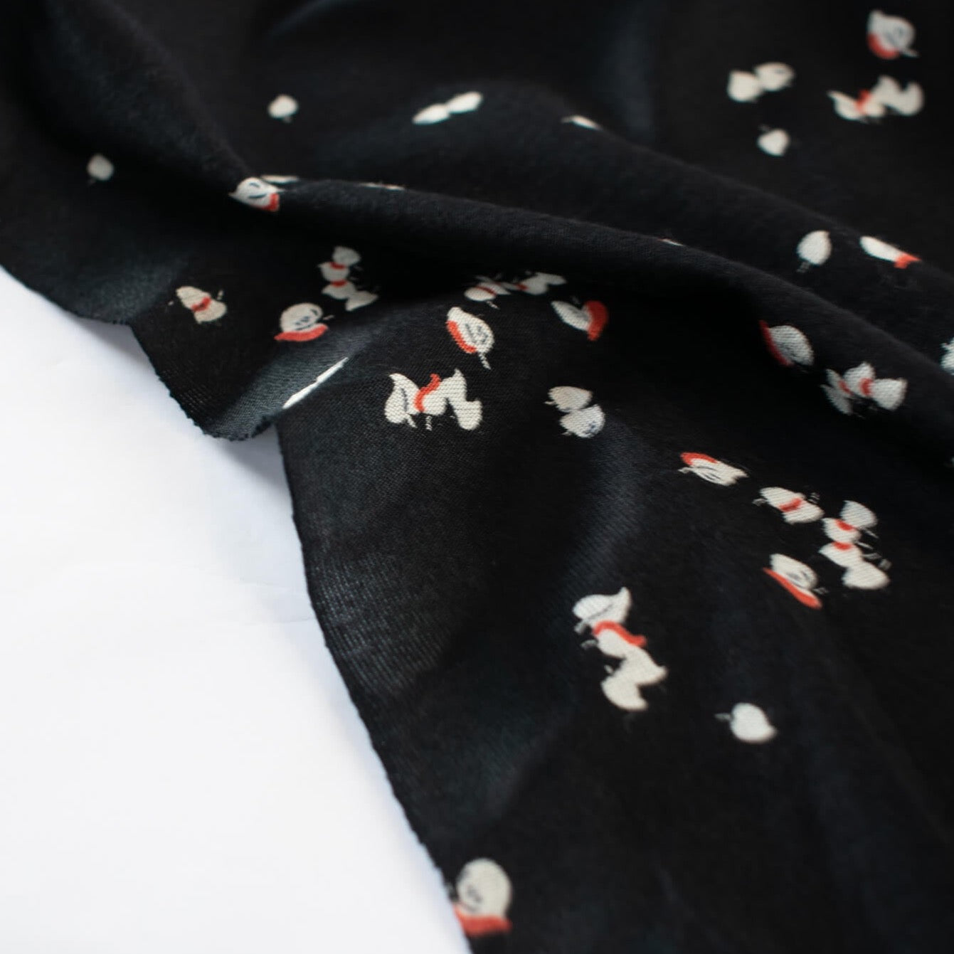 Silky soft cotton modal blend from the Italian mills.  Tiny leaves of red and light taupe fall against deep black in this luxurious jersey knit.  This fabric just feels good...the modal adds such an incredibly soft touch that this will be sure to become a favorite.   Create a striking top or take advantage of the beautiful drape of this fabric and whip up a Maxi dress!