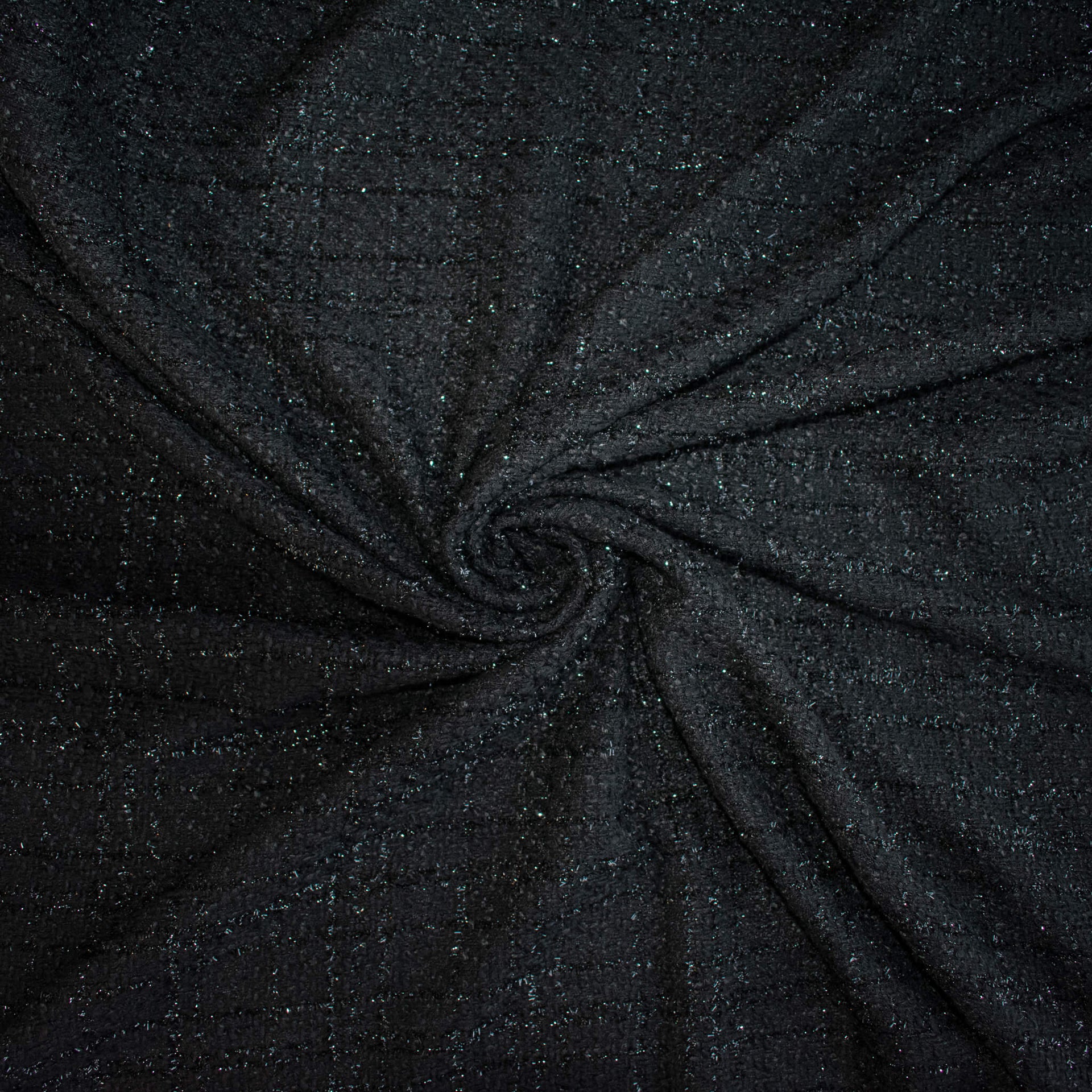 Designer Black Boucle fabric swirled to show fabric fullness.