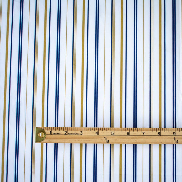 Bring effortless sophistication to your look with the 'Effortless' LA Designer Striped Cotton Shirting fabric by the yard. Crafted from luxurious 100% cotton, this designer shirting ensures you look on-trend with minimal effort! Image of fabric with ruler for design scale.