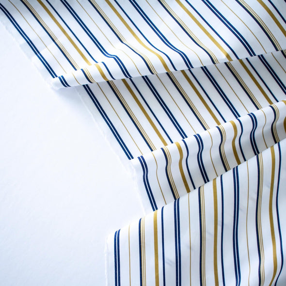 Bring effortless sophistication to your look with the 'Effortless' LA Designer Striped Cotton Shirting fabric by the yard. Crafted from luxurious 100% cotton, this designer shirting ensures you look on-trend with minimal effort! Close-up image  of fabric