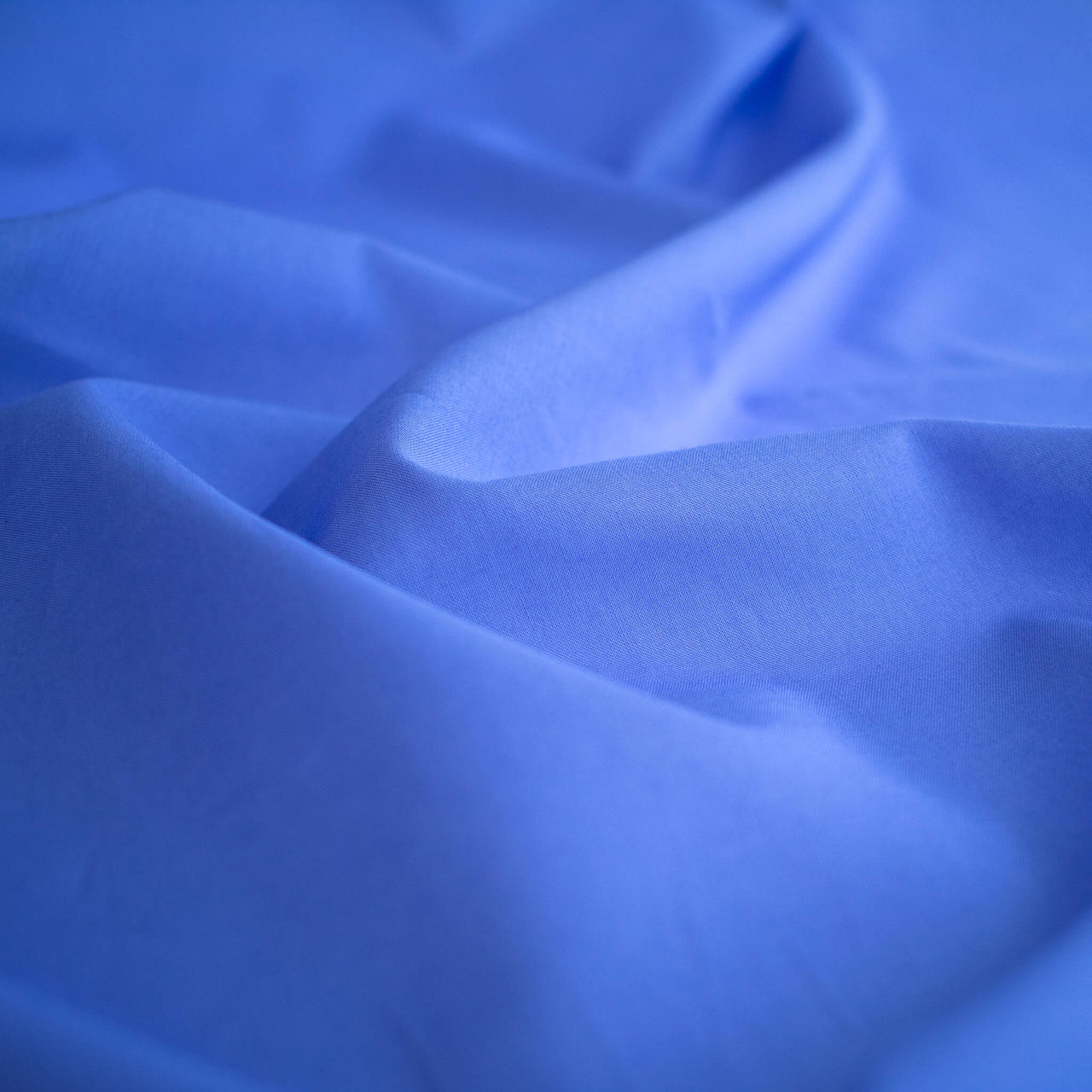 Close-up of Blue  Cotton Lawn fabric.