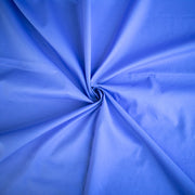 Close-up of blue cotton lawn designer fabric.