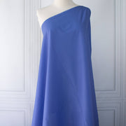 Close-up of blue cotton lawn designer fabric on dressform.