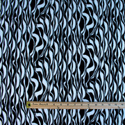 Image with ruler for pattern scale of  Black and Ivory Italian ITY jersey knit fabric by the yard