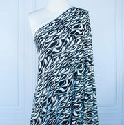 Image on dressform of  Black and Ivory Italian ITY jersey knit fabric by the yard