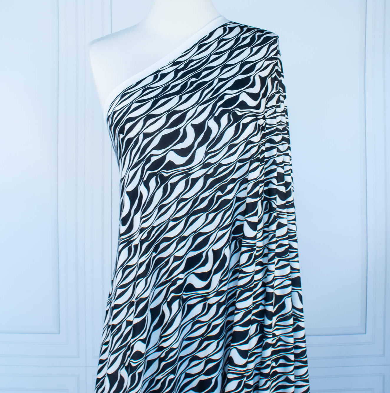 Image on dressform of  Black and Ivory Italian ITY jersey knit fabric by the yard