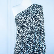 Image on dressform of  Black and Ivory Italian ITY jersey knit fabric by the yard 