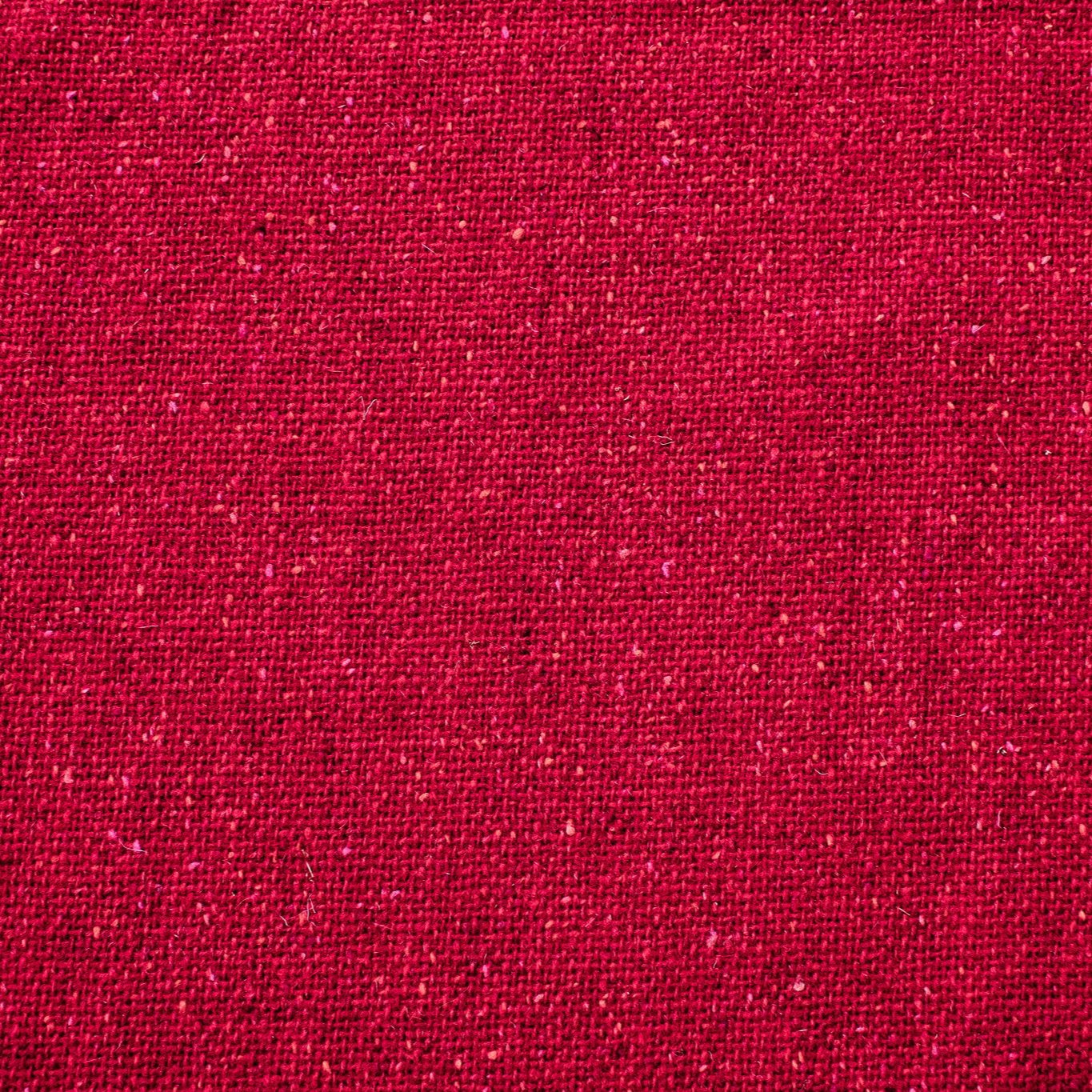 Italian Couture Red Melange YS1 Designer Boucle Virgin Wool fabric by the yard. Discreet luxury at its finest, this beautiful woolen boucle from an exclusive design house is the epitome of French elegance. Image of fabric.