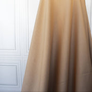 Image on dressform of High End British Designer Ponte De Milano  fabric in a classic tan color. 