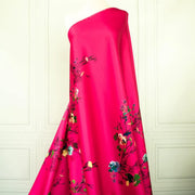 Image of Couture dark pink duchesse satin fabric draped on dress form.