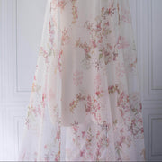 Floral Couture designer soft white silk chiffon fabric with pink flowers and green leaves draped on dressform